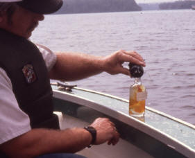 Figure 3. Measuring oxygen using the Winkler technique. The brown color is an indication that oxygen is present. A subsequent titration will quantify this oxygen value.